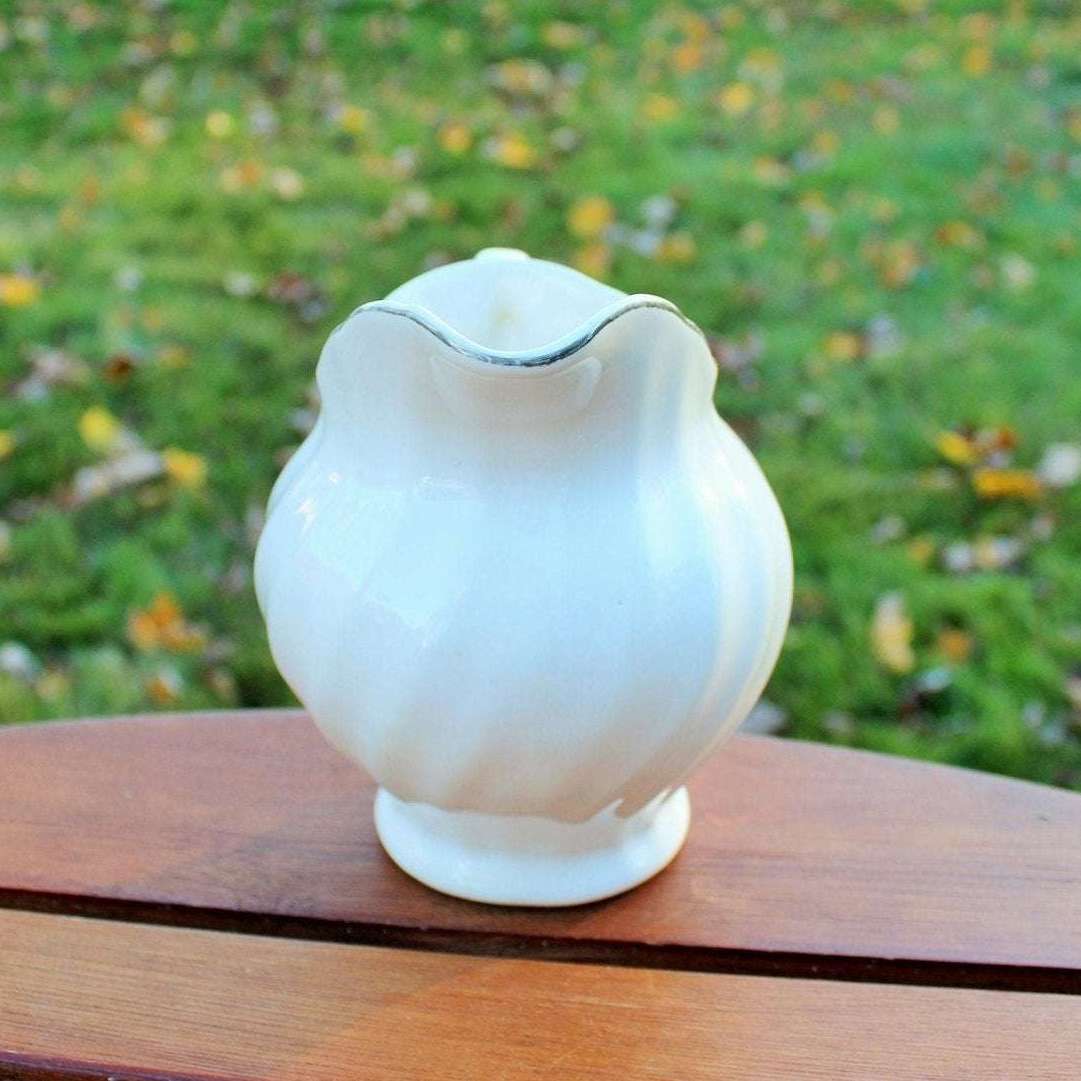 Vintage white ceramic swirl creamer with silver trim, photo 8 of 10