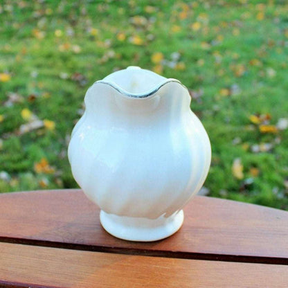 Vintage white ceramic swirl creamer with silver trim, photo 8 of 10