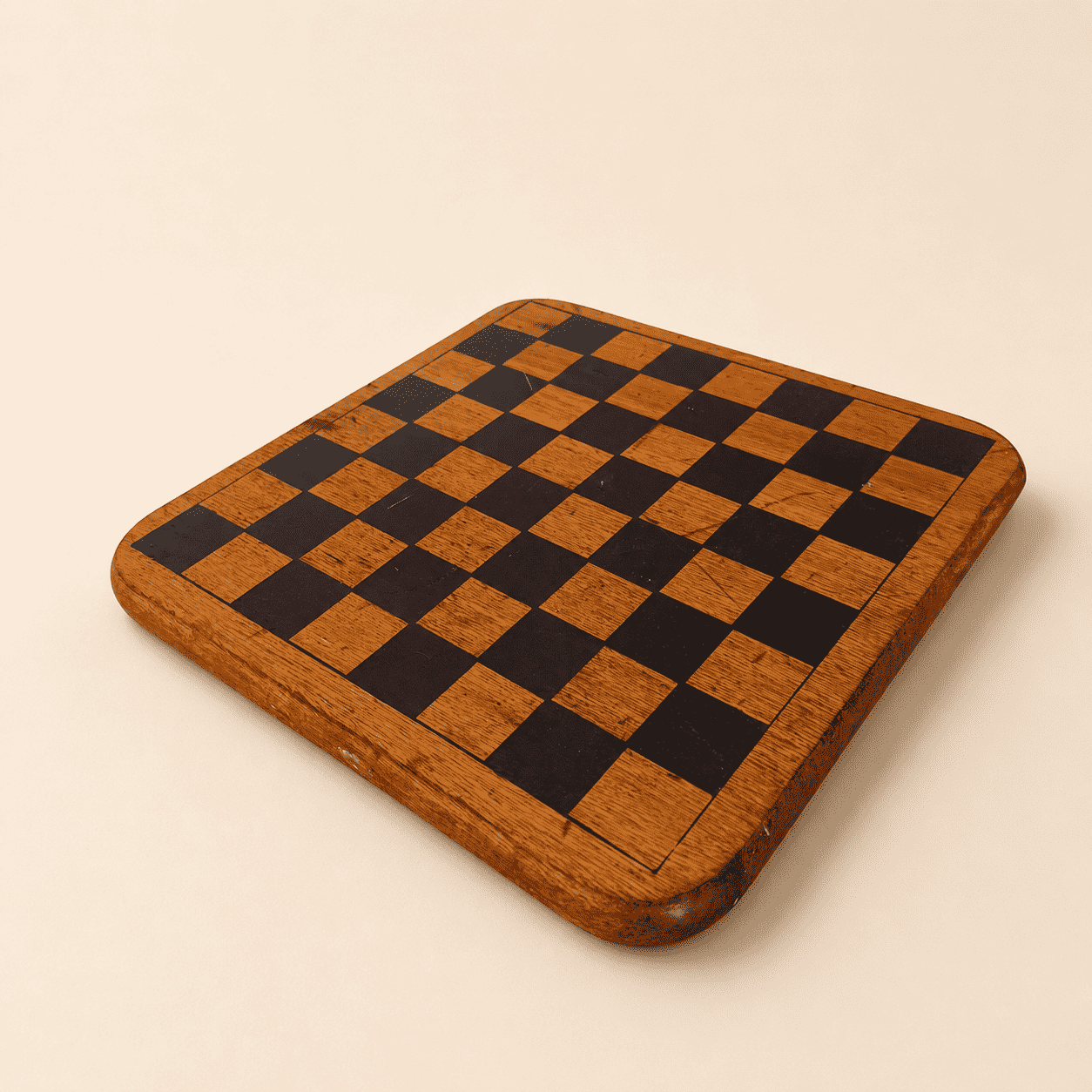 Angled view of the double-sided wood game board showing thickness