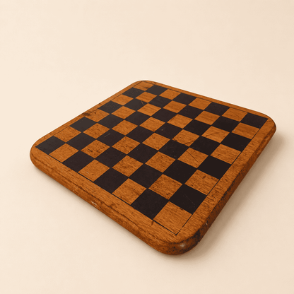 Angled view of the double-sided wood game board showing thickness