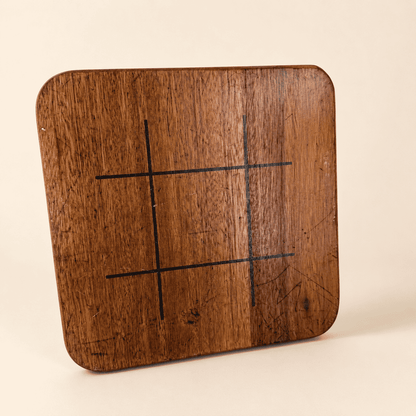 Reverse of the game board showing the tic-tac-toe grid
