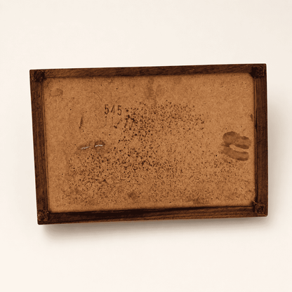 Base of the jewelry box showing the "11/77" date stamp