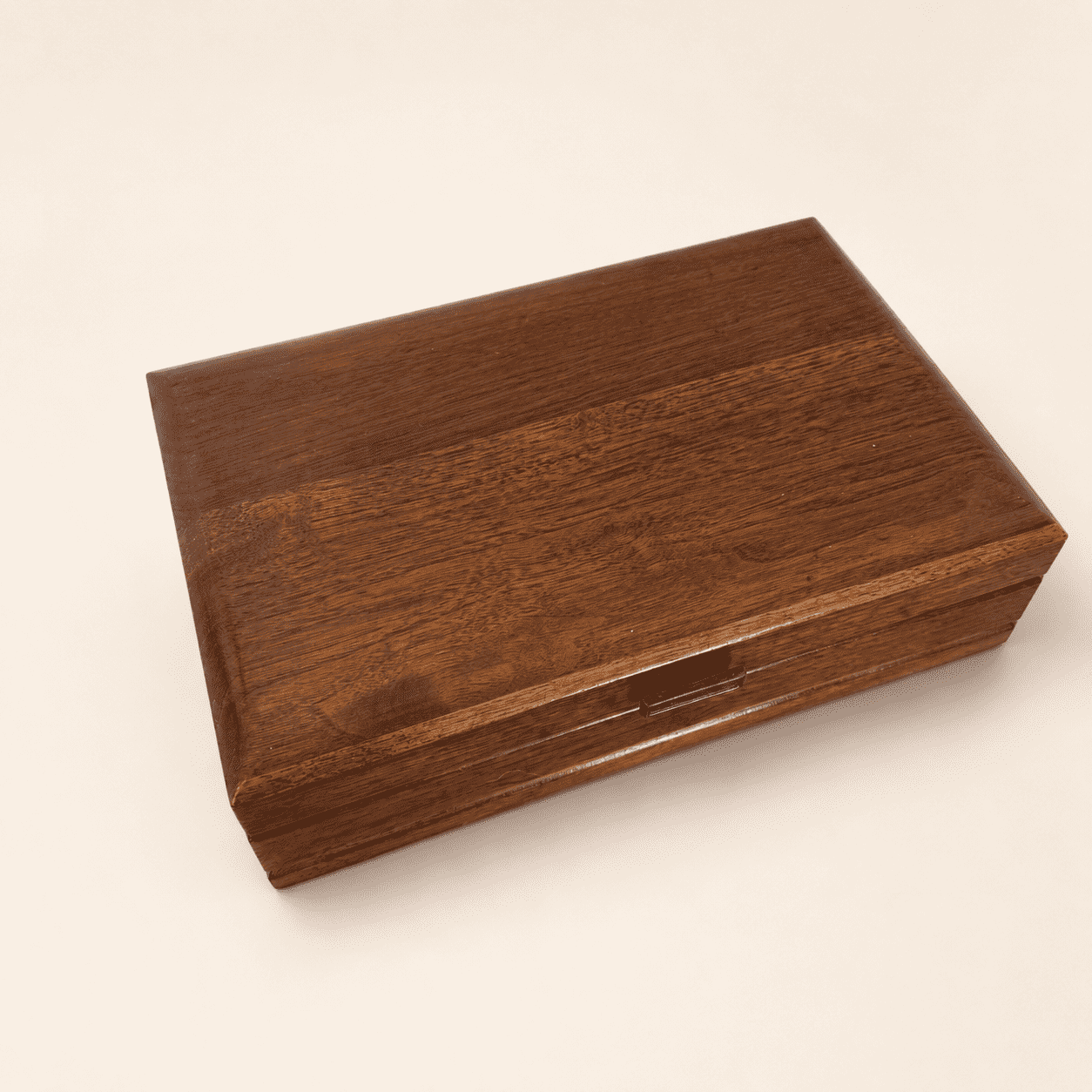 Angled view of the closed wood jewelry box