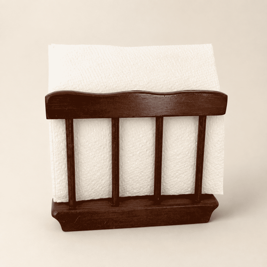 Wood napkin holder styled with a white napkin
