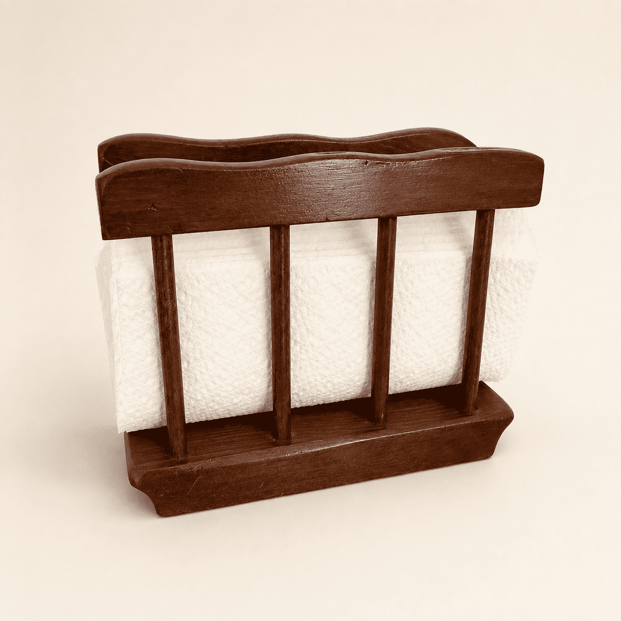 Colonial spindle napkin holder holding folded napkins