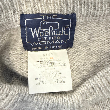 The Woolrich Woman label — size XL, 85% wool, made in China