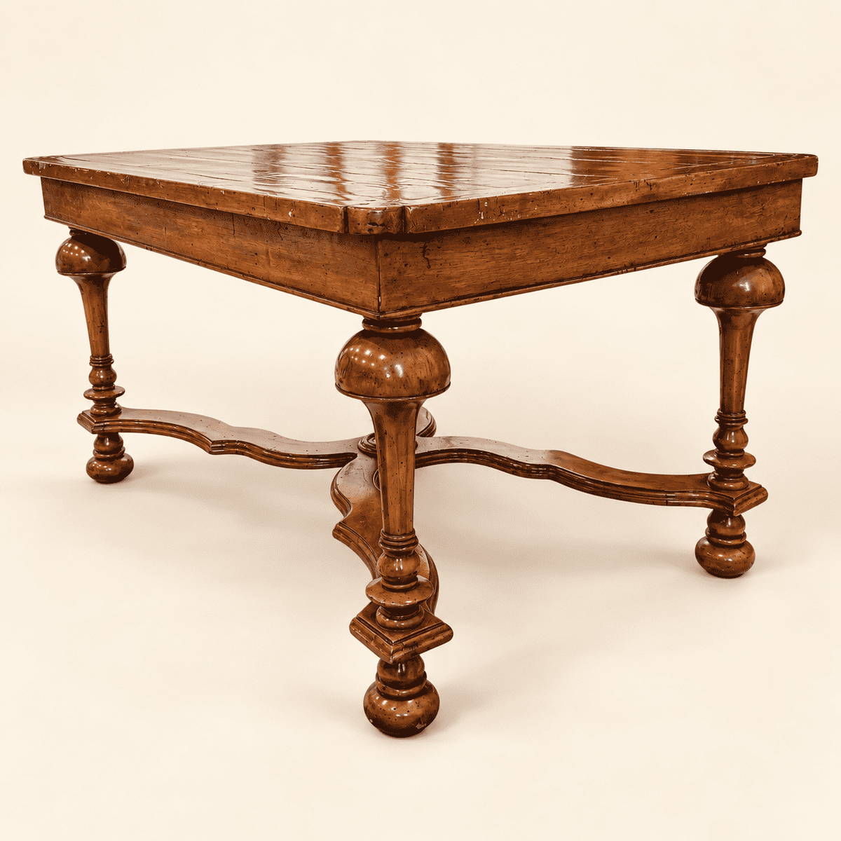 William & Mary style walnut coffee table with turned legs, bun feet and shaped X-stretcher, front view