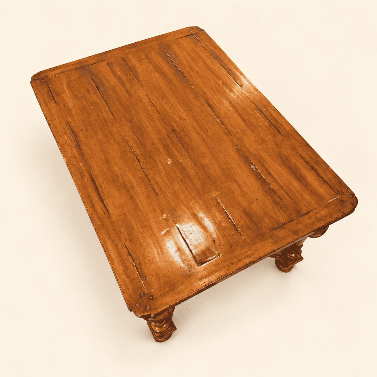 Distressed French walnut plank top with breadboard ends on William & Mary style coffee table