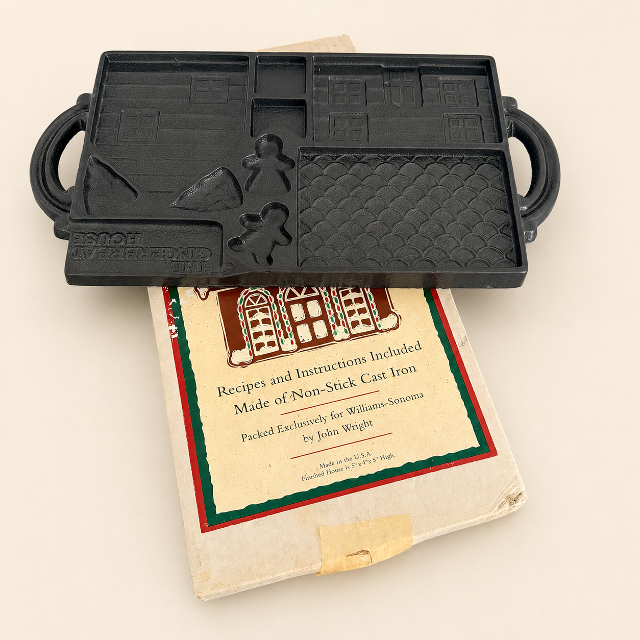 Williams-Sonoma gingerbread house cast iron mold shown with its original box