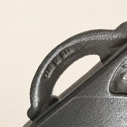 Cast iron handle detail with molded John Wright maker's lettering